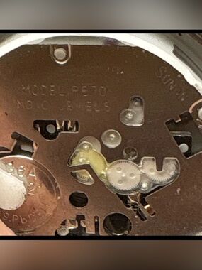 Rolex Silver and Gold Watch Movement Close-Up
